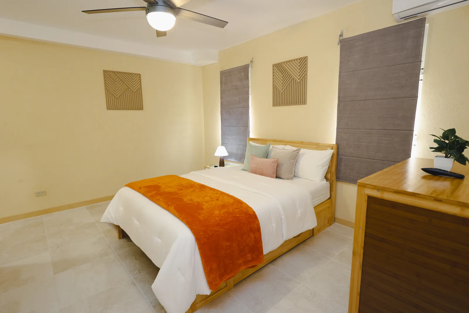 Furnished bedroom at Santa Cruz Suites