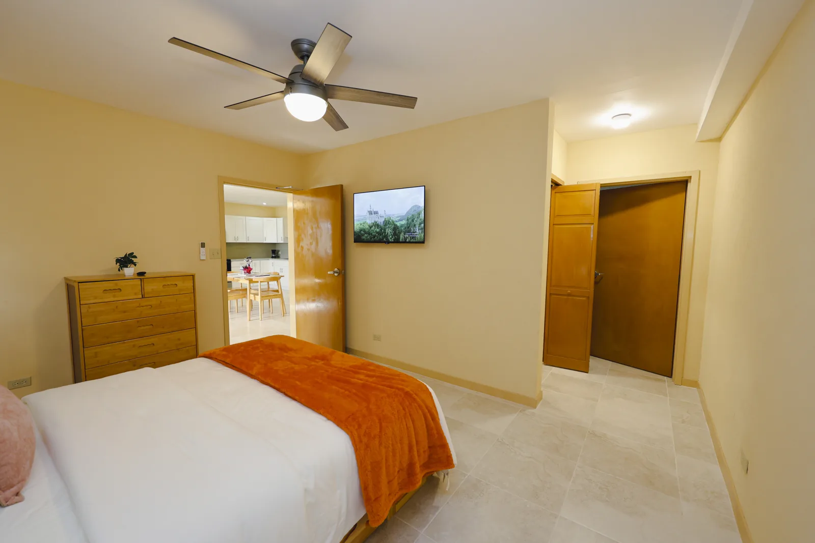 A furnished bedroom at Santa Cruz Suites